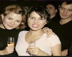 Anna Friel consuming alcohol